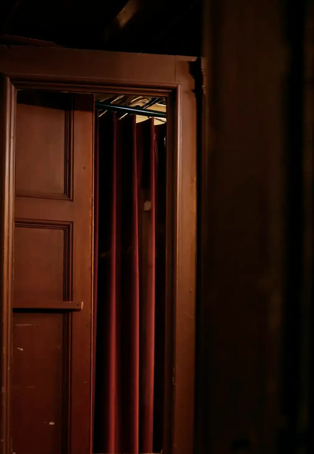 A old-school open wooden Door